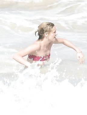 Kirsten Dunst in a wet swimsuit